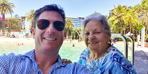 Photo of Nick (left) and Shirley (right) by the South Bank Beach in Brisbane